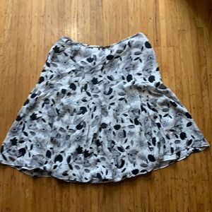 Floral black and white pleated skirt